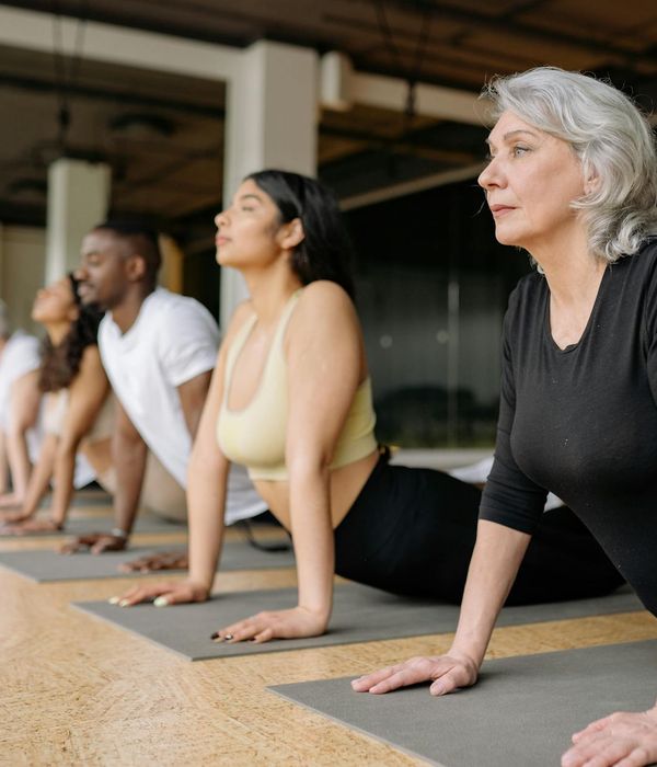 Person stretching, demonstrating improved flexibility.